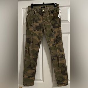 Women’s Tractor camo ripped jeans. Size 9 New with tag.